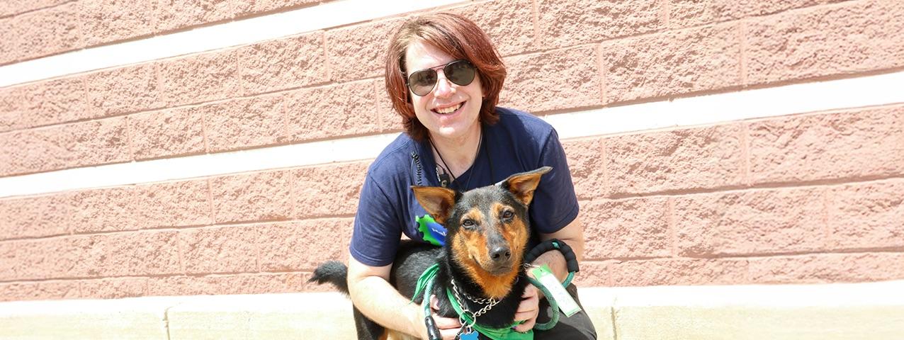 Brenden Hoehn holding his rescue dog Loki